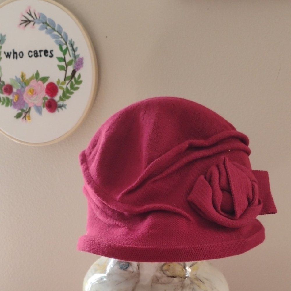 Elegant Pink Cloche Hat with Floral Accent
